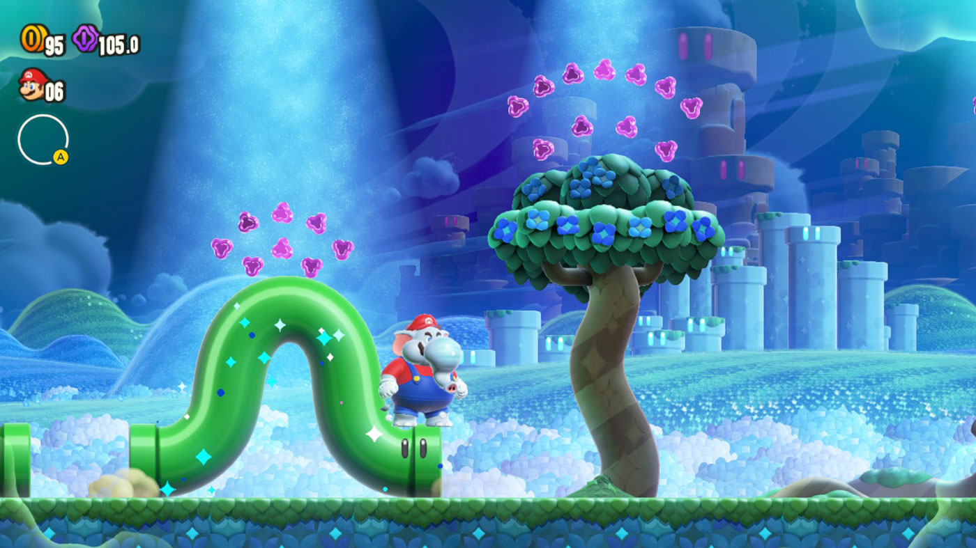 Super Mario Bros. Wonder Review - Elephant Mario Stands On Top Of A Pipe Transformed By The Wonder Flower To Move Like A Caterpillar