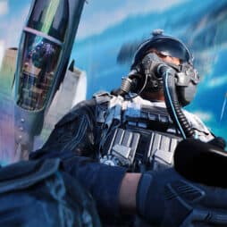 Fighter pilot wearing helmet and gear in cockpit with jet and ocean view.