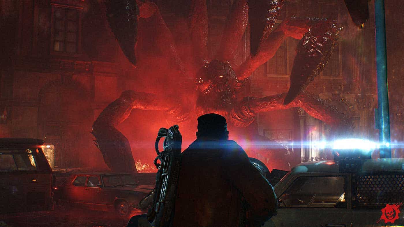 Gears Of War monster attacking in a city street at night.