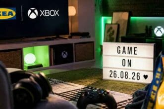 Gaming room with Xbox, IKEA furniture, and a lightbox with date.